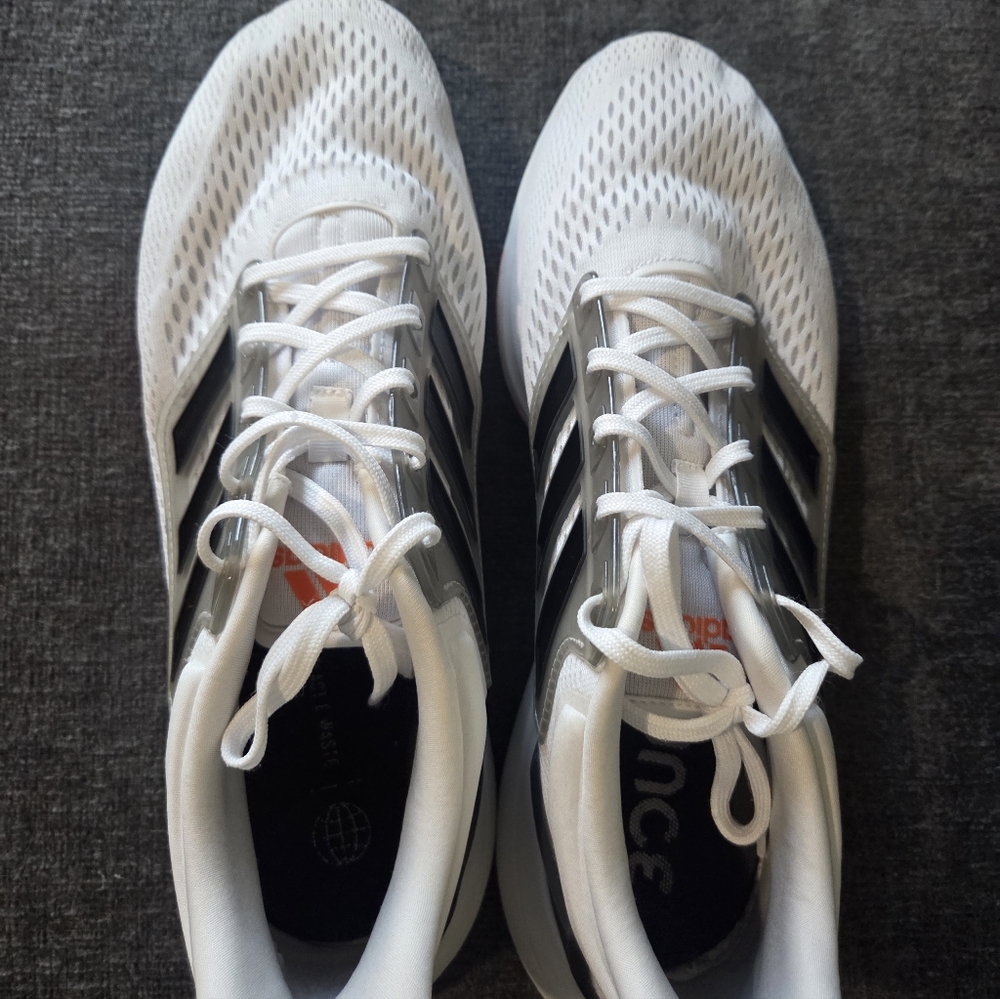 Adidas White Mesh Sneakers with Black Stripes